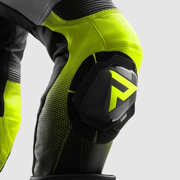PANTALON REBELHORN INFERNO NEGRO Y AMARILLO FLUOR